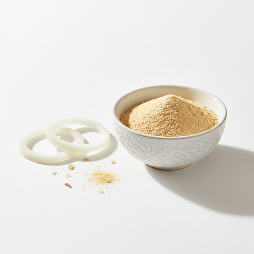 Organic Dehydrated Onion Powder in a white ceramic bowl with fresh onion rings – Roots 4 Ever